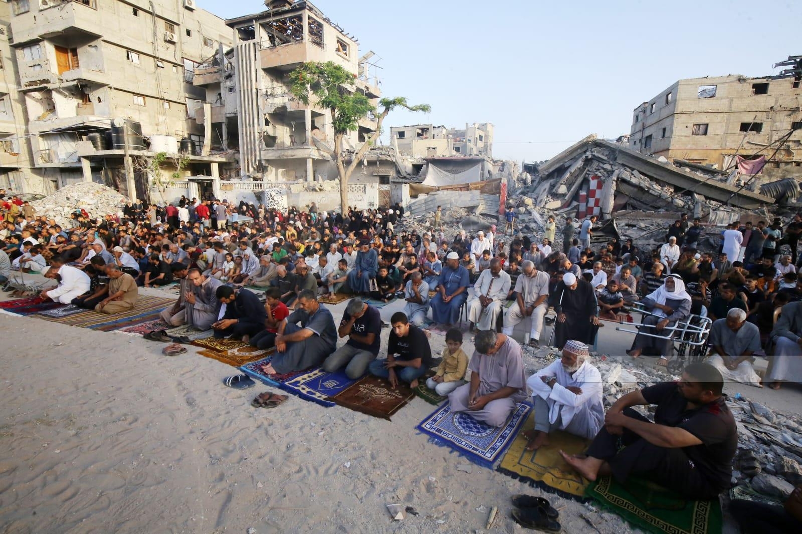 Gazans perform Eid Al Adha prayer amid ruins